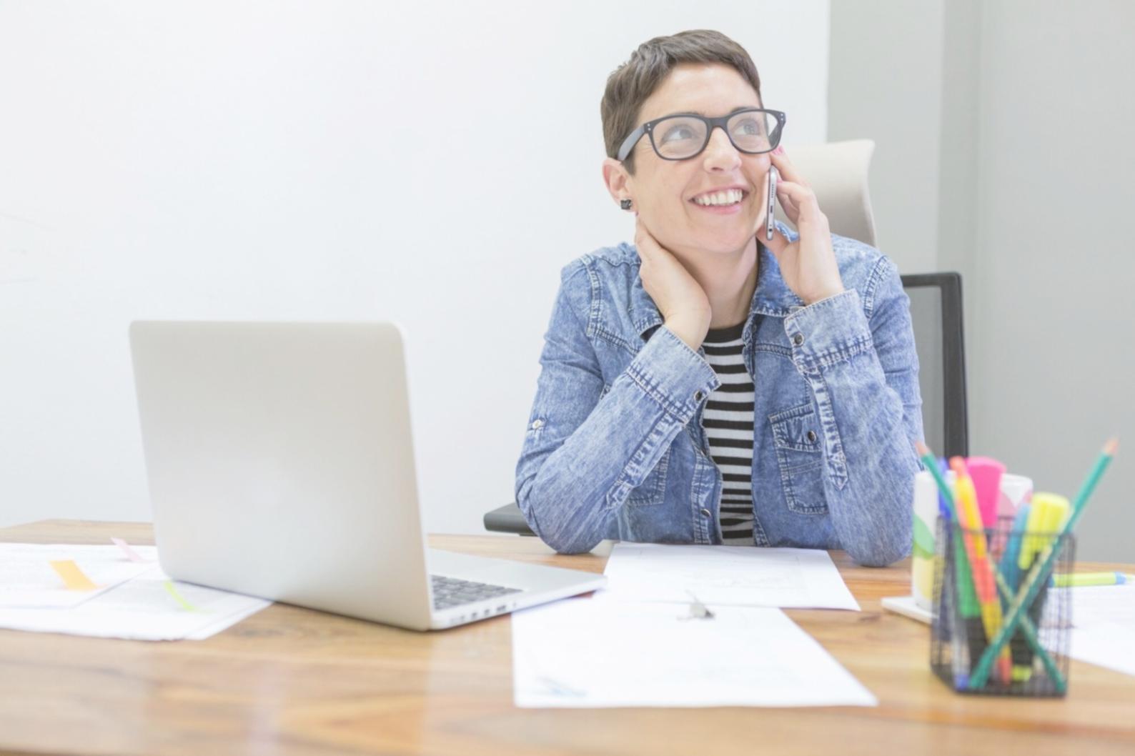 Person reviewing financial documents and budget planning materials